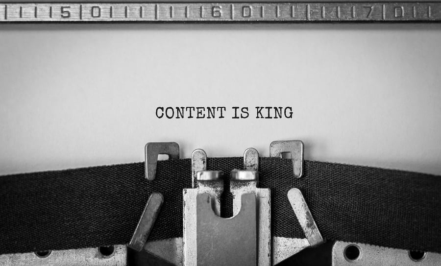 typewriter typing Content is King