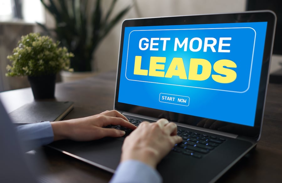 financial advisor at laptop - screen reads get more leads