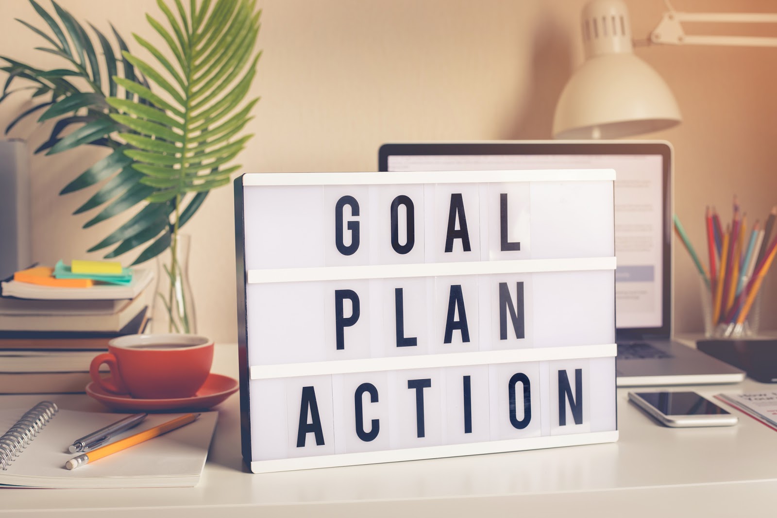 letterboard with words Goal, Plan, Action
